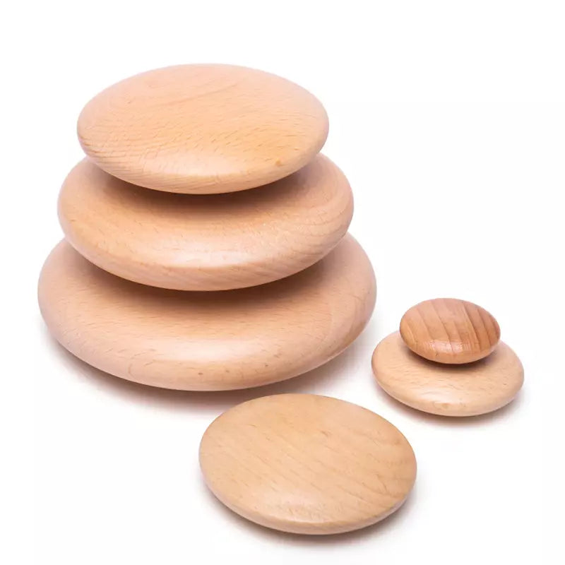 a stack of Bigjigs Stacking Pebbles on a white background.