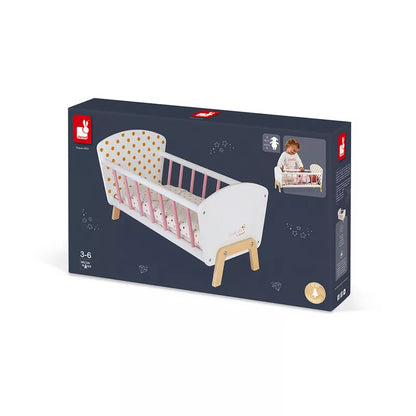 A box with a Janod Candy Chic Doll's Bed in it.