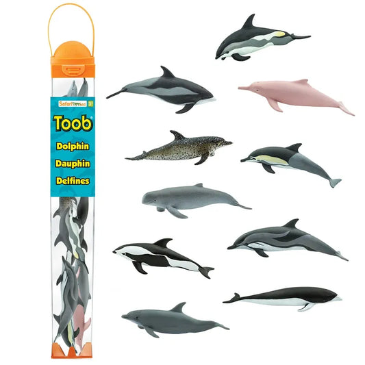 A packaging of Safari Ltd TOOB® Figurines Dolphins featuring various dolphin figures, including orcas and a pink dolphin, each with detailed, realistic designs. The package is long and cylindrical with a clear