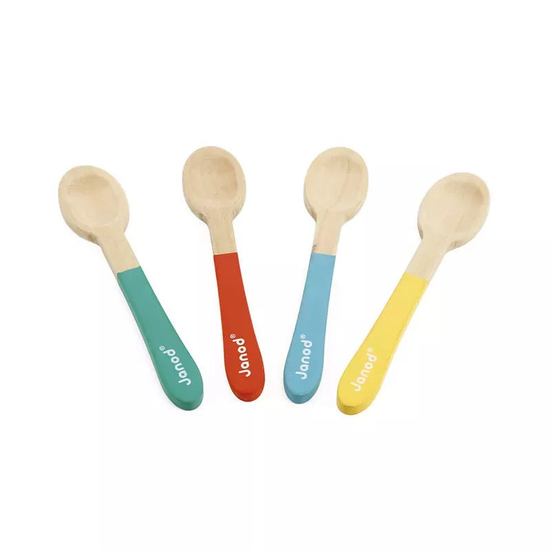 Four Janod Egg-And-Spoon Race with painted handles lying flat on a white background.