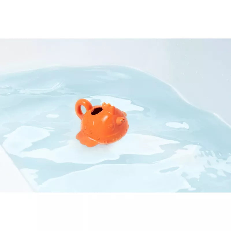 A Paulette Floating Watering Can ECO animal floating in a pool of water.