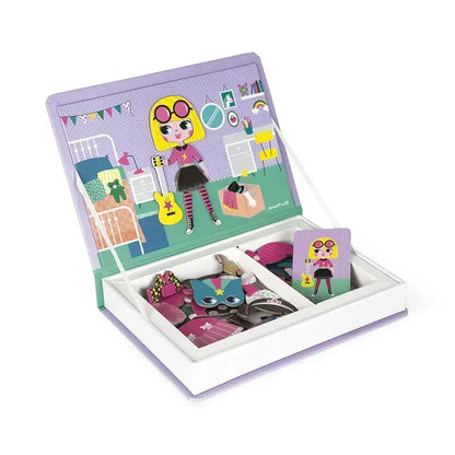 The Janod Girl's Costumes Magneti'book is a colorful magnetic dress-up set that features a character in a vibrant purple and green room. This educational toy includes various magnetic clothing and accessories, all neatly organized in a box with an easel-like lid displaying a dressed figure.