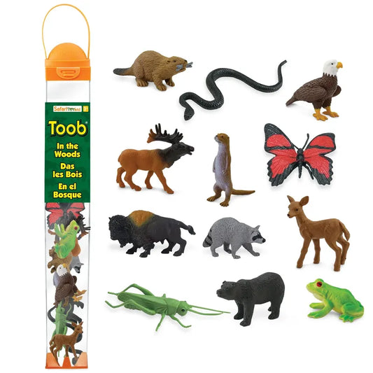 Packaging of "TOOB® Figurines In the Woods" featuring hand painted figurines of various animals including a bear, deer, eagle, and more, alongside an image of a tree.