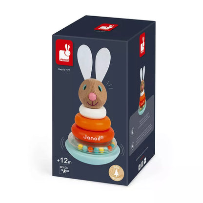 A Janod Roly-Poly Rabbit Stacking Toy box with the toy rabbit on top of it.