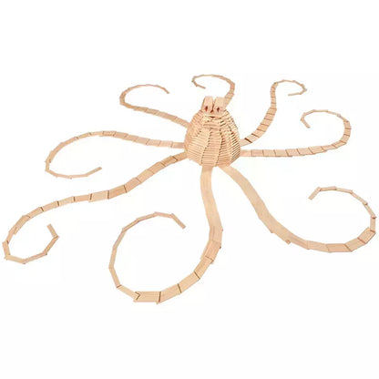 A wooden octopus sculpture, crafted from KAPLA® Construction 1000 Planks in Wooden Box, features intricate, articulated tentacles spread out in a radial pattern.