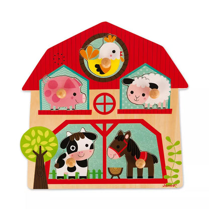 A Janod Musical Puzzle – Friends of the Farm with farm animals and a barn.