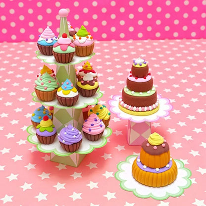 A set of Sentosphere Patarev Clay Cupcakes on a pink polka dot background.