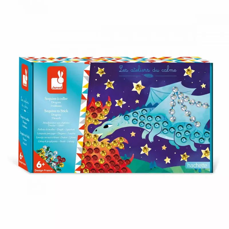 Introducing the Janod Sequins To Stick Dragons craft kit, perfect for dragon-loving artists! This predominantly blue box with red and yellow accents features a dragon adorned with multicolored sequins and gems. The title "Les ateliers du calme" is proudly displayed in the upper right corner, alongside the Janod and Hachette logos. Suitable for ages 6 and up.