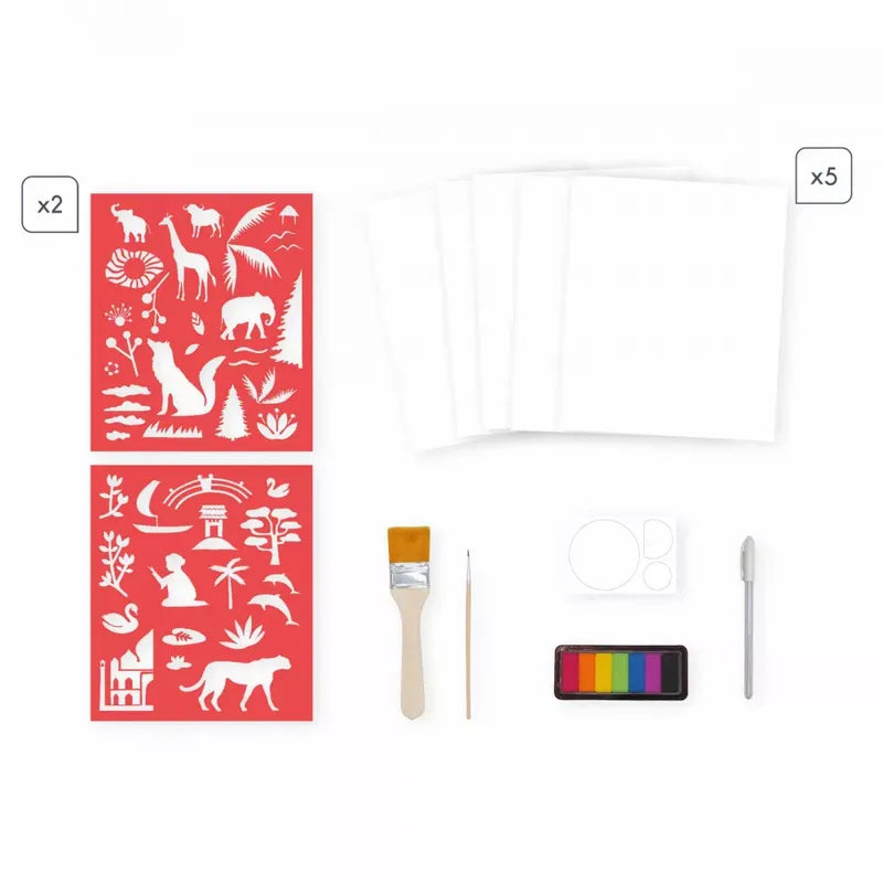 The Janod Sunset Lover art and craft set includes two sheets of red stencils featuring nature and animal designs, five blank sheets of white paper, a wide paintbrush, a fine-tip brush, a watercolor paint set with six colors, a circular palette for mixing, and a white pen. It's perfect for creating amazing sunset painting crafts!