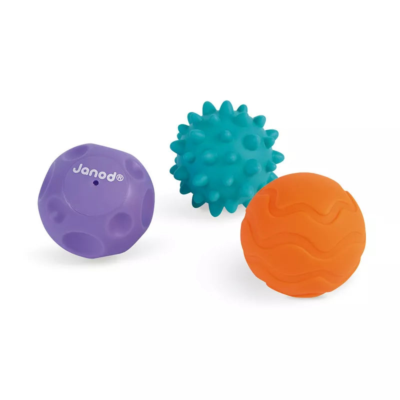 A couple of Janod Tacti'Basket Bath Toys that are next to each other.