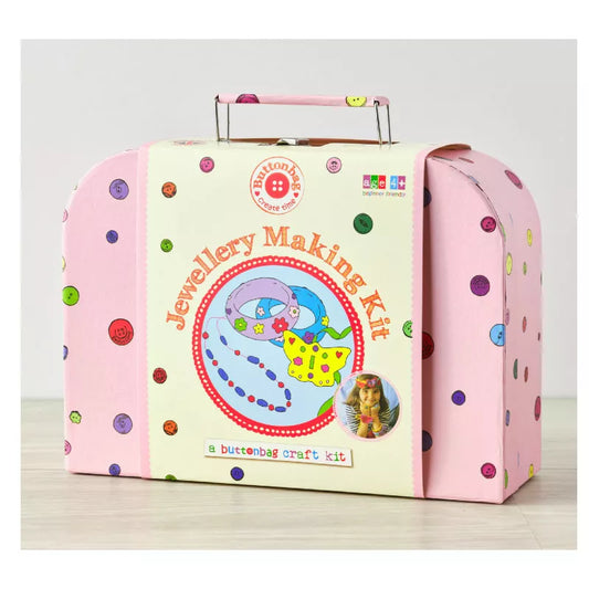 a Buttonbag Jewellery Making Suitcase Kit with polka dots on it.