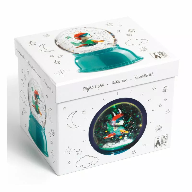 A white Djeco Snow Ball Nightlight Airplane box with a clock inside of it.