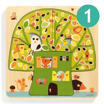 A Djeco Chez Nut 3 Layers Puzzle with an image of a tree.