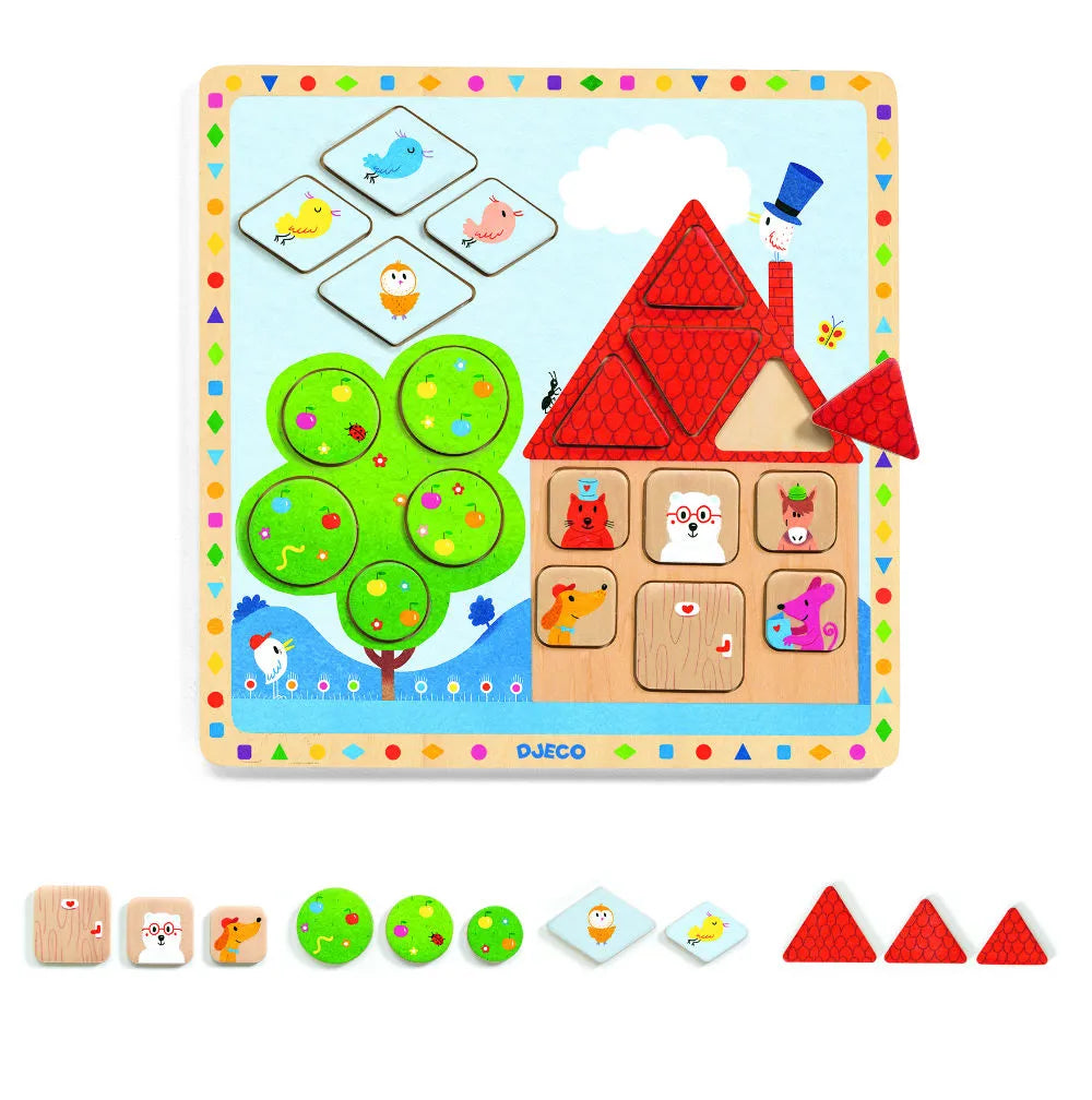 A Djeco wooden puzzle with a house and trees.