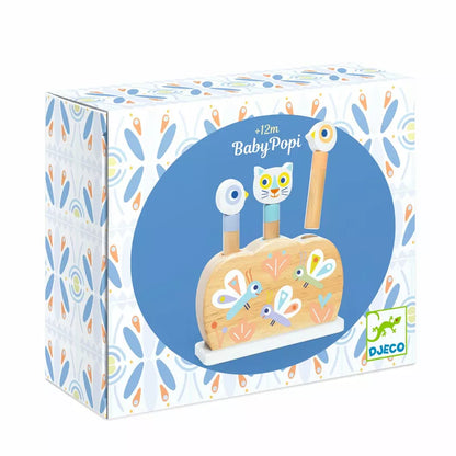 A Djeco cardboard box with a picture of a Djeco BabyPopi suitcase.