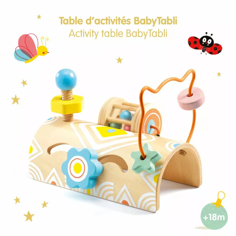 A Djeco BabiTabli toy with a lady bug on it.