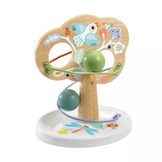 A Djeco BabyTree sliding toy with a green ball in it.