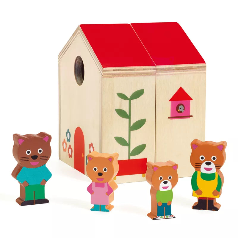 A group of wooden toy animals standing next to a Djeco Minihouse.