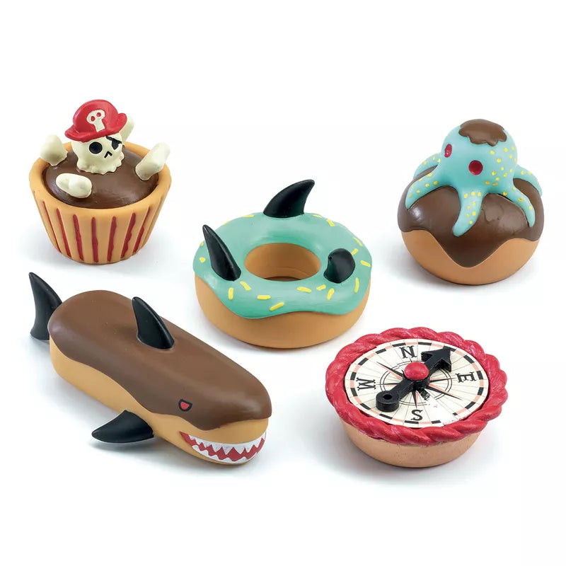A group of Djeco Pirate Cakes toys of different shapes and sizes.