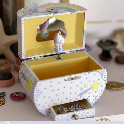 A Djeco Musical Box Dreams of unicorn is in a little box.