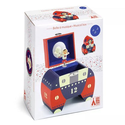 A Djeco Musical Box Polo 12 with a toy elephant inside of it.