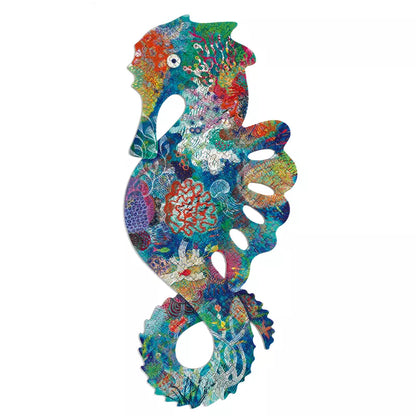 A colorful Djeco Puzz'Art Sea Horse made out of paper on a white background.