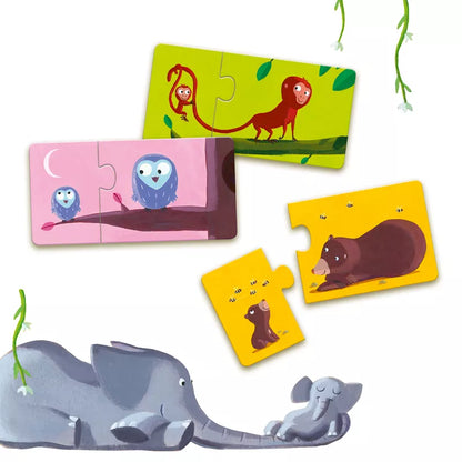 A group of Djeco Mom and Baby Puzzle pieces with animals on them.