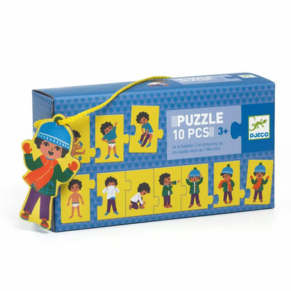 A Djeco Puzzle I'm dressing up box with a picture of a boy on it.