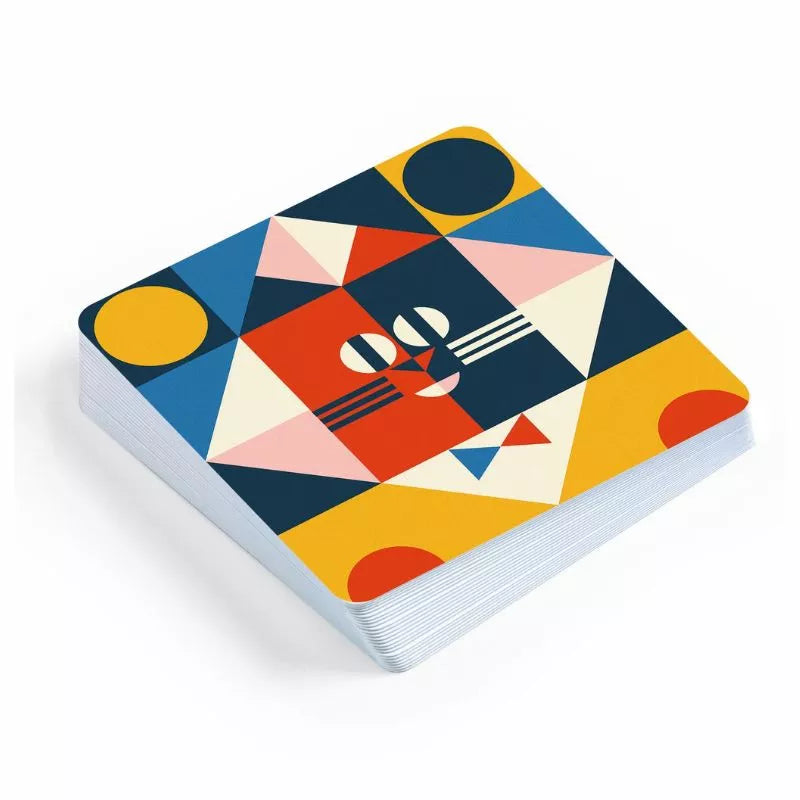 A Djeco notebook with a colorful design on the cover.