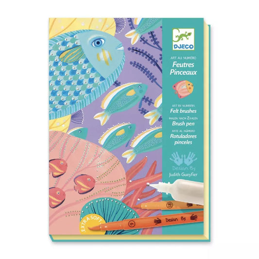 A Djeco notebook with an image of a fish on it using their Felt Tips Brush Pens Under the Sea.