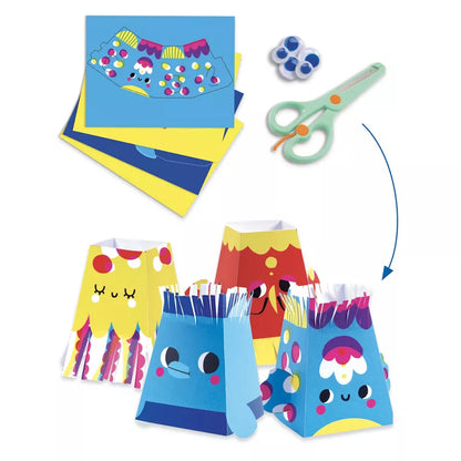 A group of Djeco Seaside Delights Creative Packs with Djeco scissors and a pair of scissors.