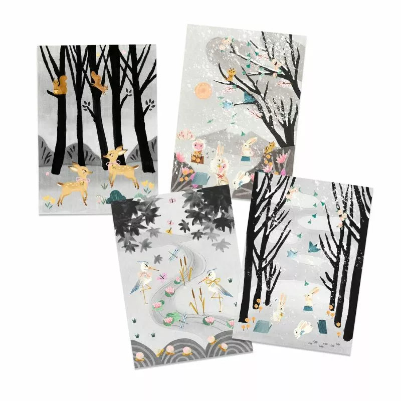 Three Djeco Workshop The Last Snowfall greeting cards with trees and animals on them.