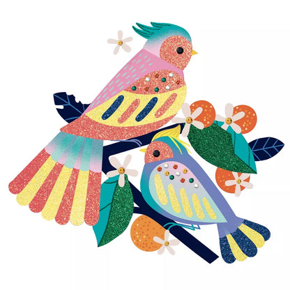 A couple of birds sitting on top of a Djeco Glitter boards – Paradisio.