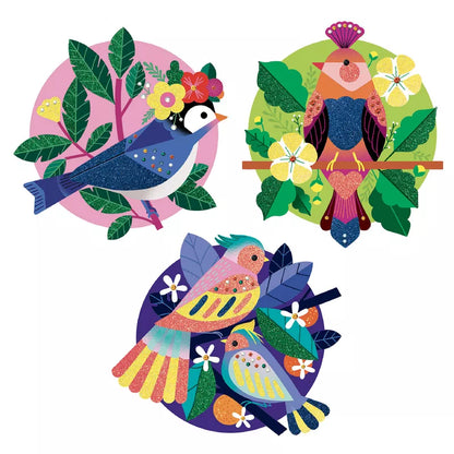 A couple of birds sitting on top of a Djeco Glitter boards – Paradisio tree.