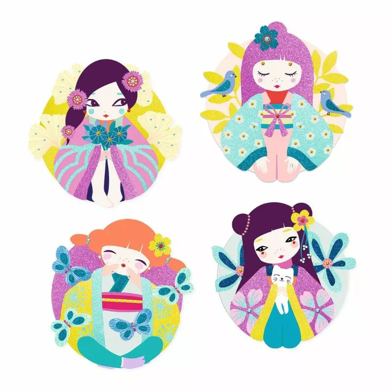 A set of four Djeco Glitter Boards Onnanoko stickers with different designs on them.