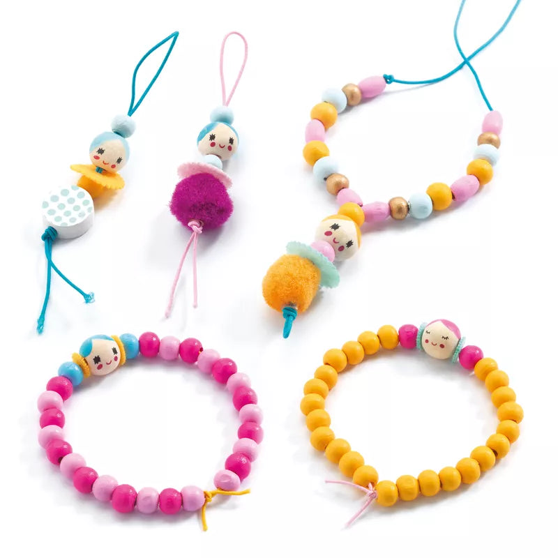 A collection of Djeco Beads and Figurines bracelets and toys.