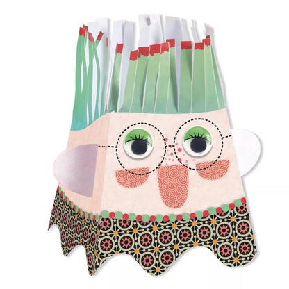 A close up of Djeco Snip Snip Characters paper bag with a face.